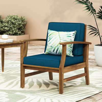 Fauteuil club moderne en bois bleu, décor et lattes