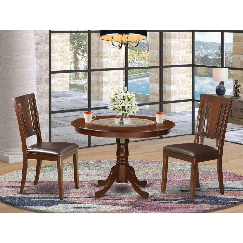 3 Piece Dining Table Set for Small Spaces Contains a Round Dining Room Table with Pedestal and 2 Faux Leather Chairs, Mahogany