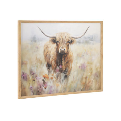 Highland Cow in a Flower Field Landscape by The Creative Bunch Studio Framed Wall Art Print