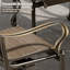 Chaise berçante pivotante d'extérieur en aluminium coulé avec assise en textilène et dossier haut