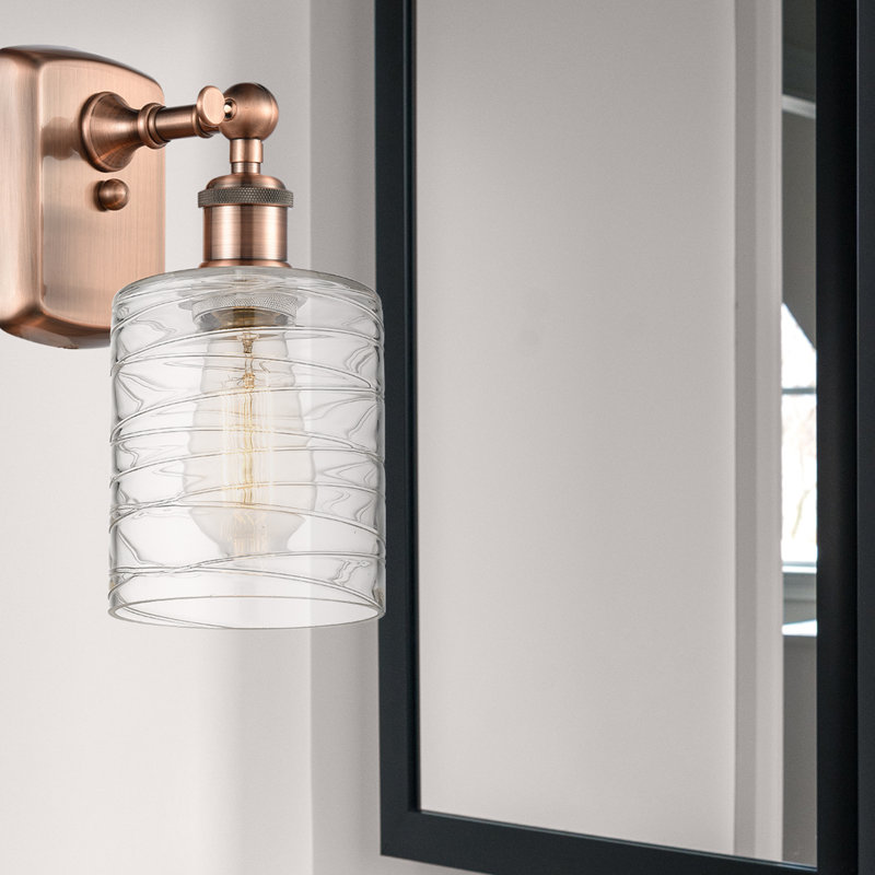 Whitmer Armed Sconce, LED, Antique Copper, Clear Deco Swirl