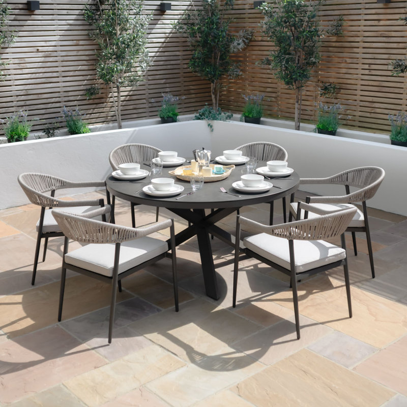 Oliveros 6 - Person Patio Dining Set with Round Table , Cushions Included