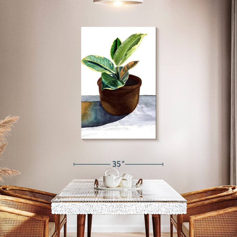 Plante dans un pot en céramique, H 45 po x l 30 po