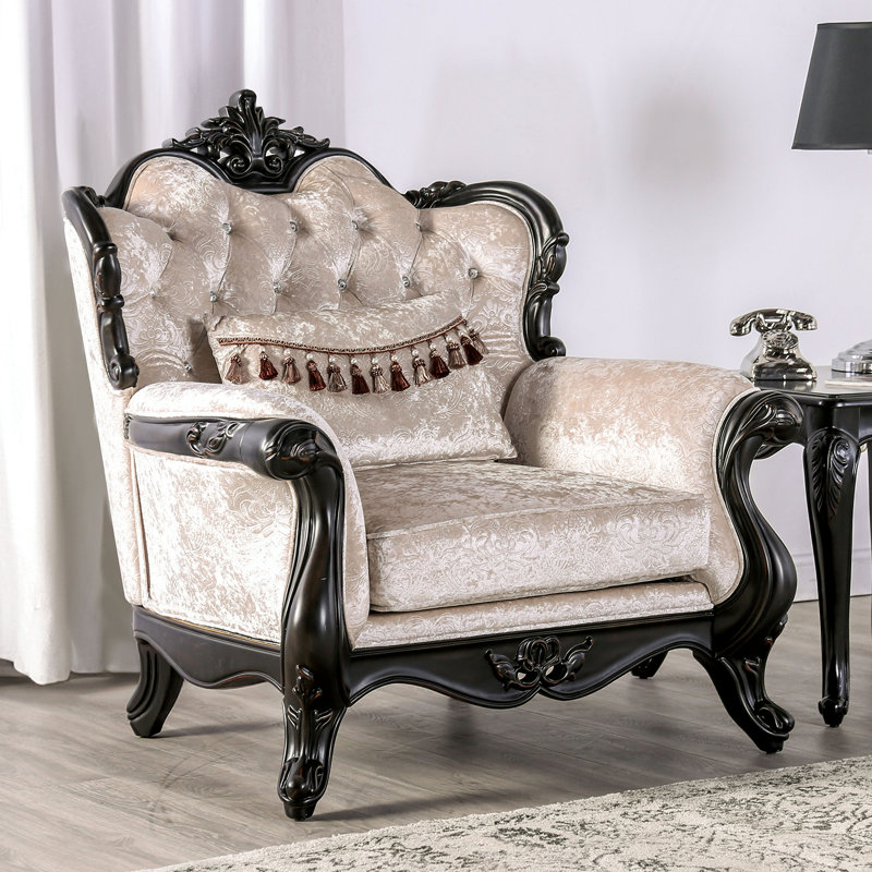 Fauteuil capitonné à motif de losanges de style traditionnel avec dossier à oreilles de style cabriole et moulures couronnées noir et blanc cassé