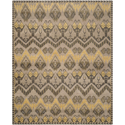Tapis ikat en laine / coton noué à la main Nesika en brun / or / beige