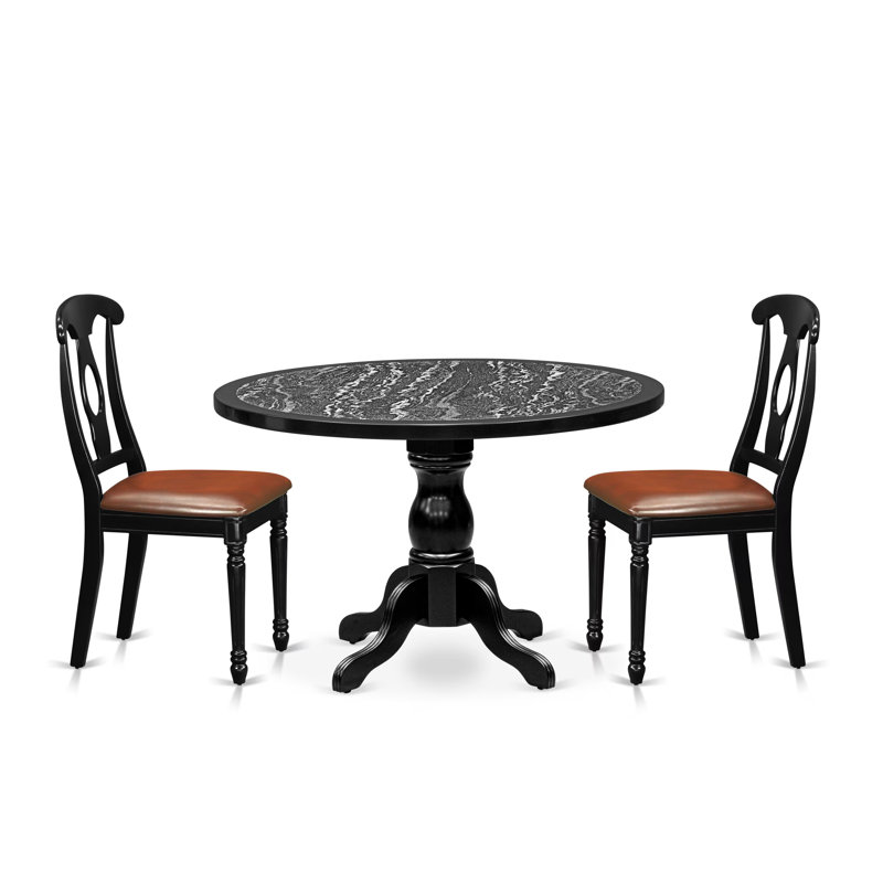 L'ensemble de table de salle à manger 3 pièces comprend une table de salle à manger à piédestal et 2 chaises de cuisine à dossier Napoléon, finition noire.