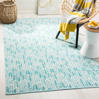 Tapis turquoise / ivoire tissé à plat à la main Legaspi