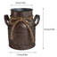 Vase en métal peint rouille