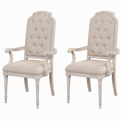 Ensemble de 2 fauteuils capitonnés à dossier