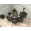 Lilia 6 - Person Wicker Patio Dining Set with Round Table , Cushions Included