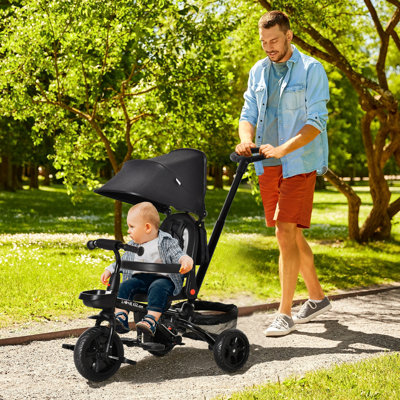 Tricycle pour enfants 4 en 1 avec siège réversible, poignée de poussée de 2,8 à 3,1 pi de hauteur, auvent, main courante, ceinture de sécurité, embrayage de frein à repose-pieds de rangement, pour enfants de 1 à 5 ans, noir