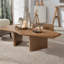 Une table basse en placage de frêne rustique, parfaite pour un petit salon, ajoutant une touche naturelle.