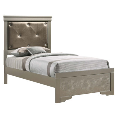 Lit simple élégant avec finition métallique, structure durable et conception élégante pour un sommeil confortable