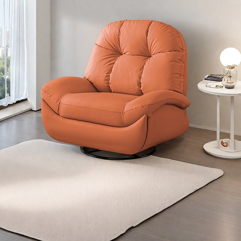 Minimalist recliner is ergonomically designed, Orange