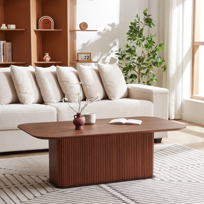 Table basse en bois de noyer avec structure en métal noir, couleurs simples pour un décor moderne pratique, brun de 27,6 po et plateau lisse facile d'entretien, espaces de vie principaux convenables