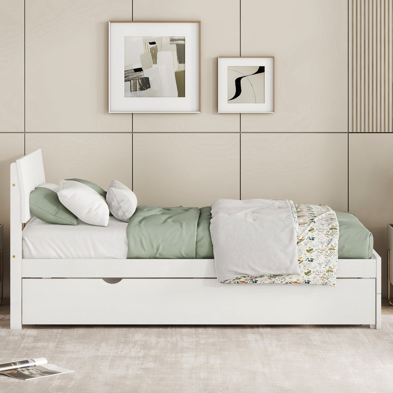 Élégant lit simple blanc crème avec lit gigogne pour un confort supérieur et une tête de lit ultrabrillante sophistiquée