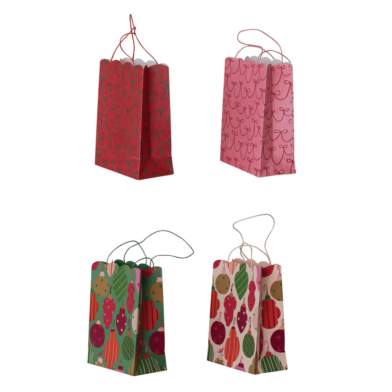 Sac cadeau en papier festonné avec motif ornemental / nœud