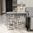 Grey And Silver End Table With Polished Metal Geometric Base