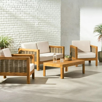 Ensemble de causeuse et table basse d'extérieur en bois d'acacia et en osier avec coussins