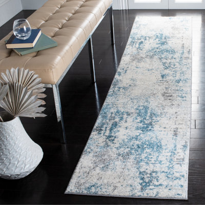 Tapis ivoire / bleu Olaughlin