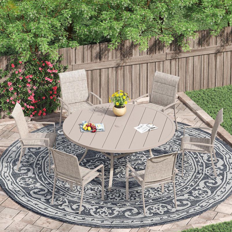 Ensemble de salle à manger de patio avec table de salle à manger ronde 47,2 po et 6 chaises rembourrées en textilène