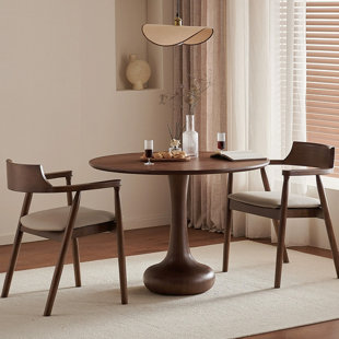 Table de salle à manger ronde en bois massif et en bois manufacturé de couleur noyer noir