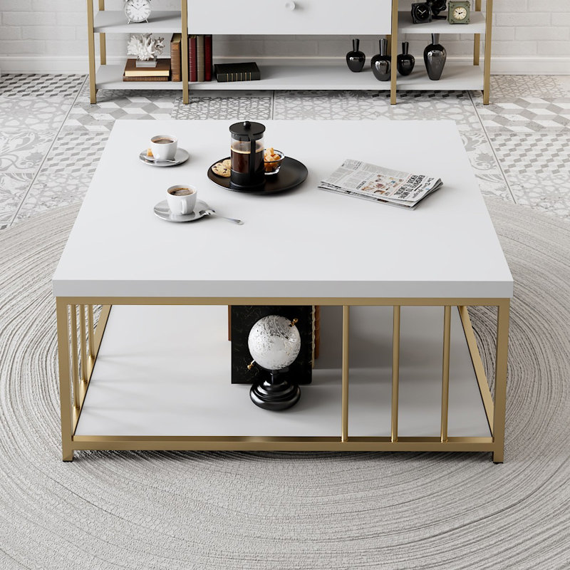 Table basse moderne, blanche et dorée, 35,4 po x 15,4 po x 15,7 po | 100% panneau de particules enduit de mélamine, épaisseur: 0,7 pouce | Pieds robustes en PVC, design élégant pour le salon glamour et les espaces contemporains