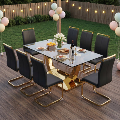 9-Piece Modern Glam 71" Tempered Glass Dining Set with Faux Leather Cantilever Chairs