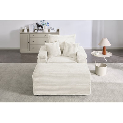 Canapé simple avec porte-gobelet et repose-pieds