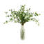 Organic Modern Smilax Arranged in a Ceramic Leaf Vase