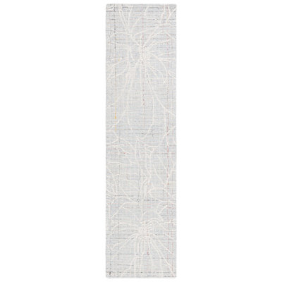 Gullbrand Hand Tufted Wool/Cotton Floral Rug in Ivory/Blue