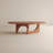 Modern Walnut Oval Coffee Table with Sculptural Arch Base