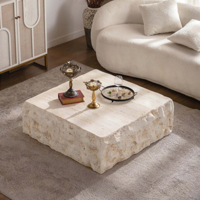 Table basse ronde avec motif en faux pierre - beige