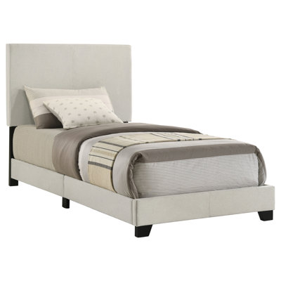 Twin Bed With Cream Upholstered Panel, Padded Headboard For A Relaxing Bedroom, Rubberwood And Engineered Wood Framework, Black Solid Legs, Bedroom Decor, Transitional Product, Box Spring Required