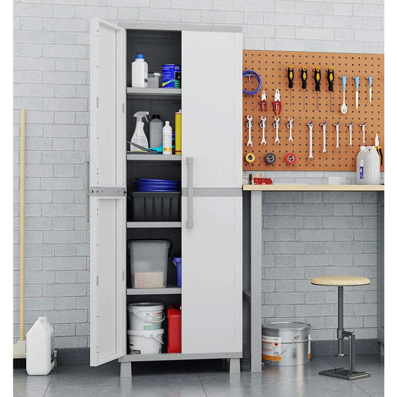 Armoire de rangement blanche et grise avec portes et tablettes pour l'organisation de la maison