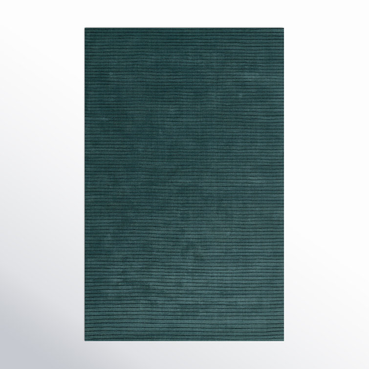 Guiness Solid Color Hand Loomed Wool Area Rug in Blue