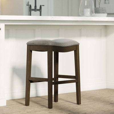 Bar-Height Saddle Stool with Footrest and Nickel Accents