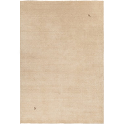 Tapis beige en laine noué à la main Stockstill