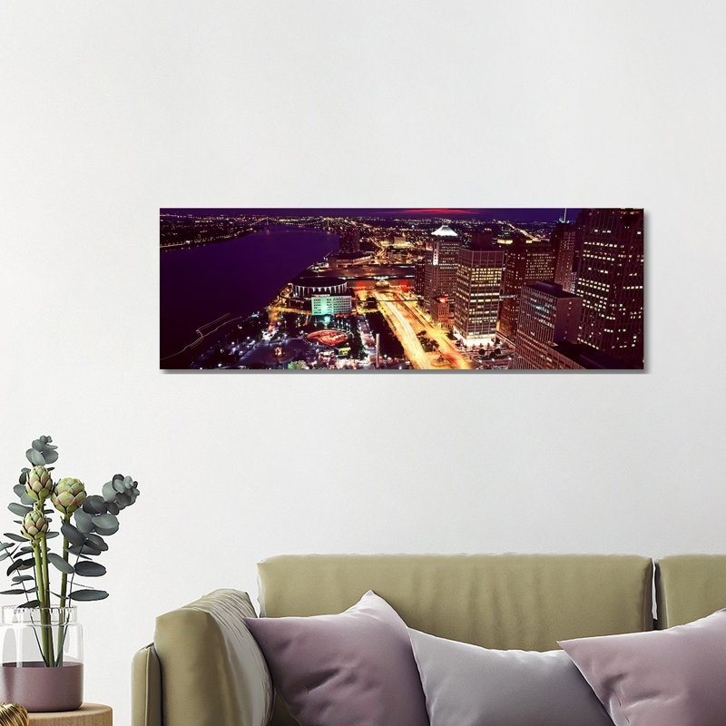 High Angle View Of Buildings Lit Up At Night, Detroit, Michigan, USA by Panoramic Images - Wrapped Canvas Panoramic Print