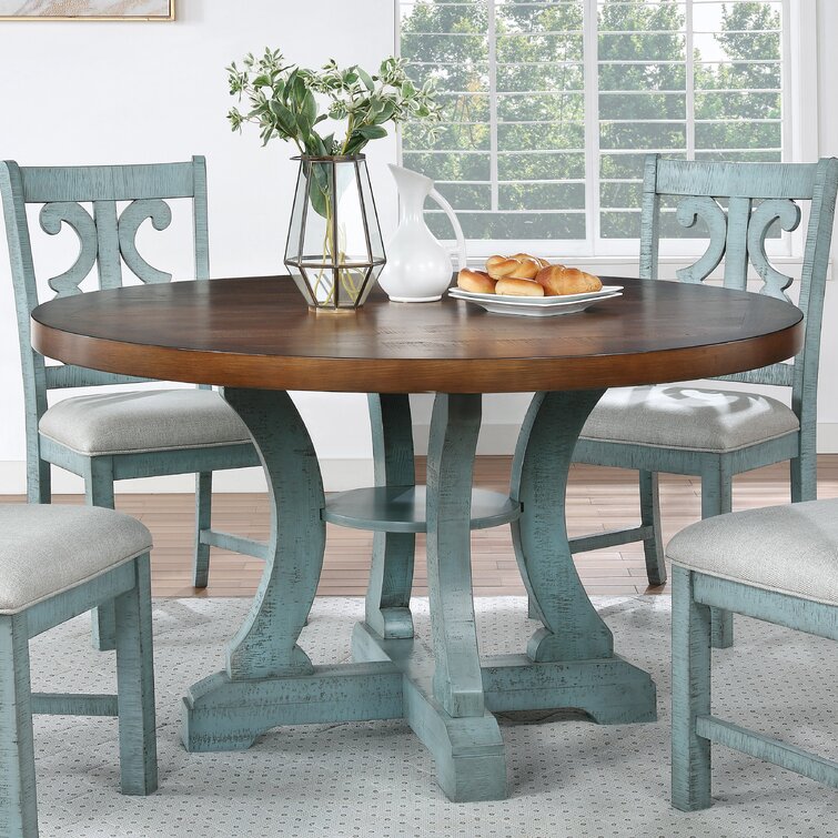 https://assets.wfcdn.com/im/91526010/resize-h755-w755%5Ecompr-r85/1332/133221580/Bella+5+-+Piece+Pedestal+Dining+Set.jpg