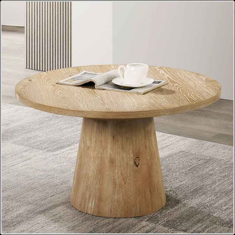 Table basse ronde de style contemporain avec piédestal en forme de cône, durable et élégante pour les espaces de vie modernes