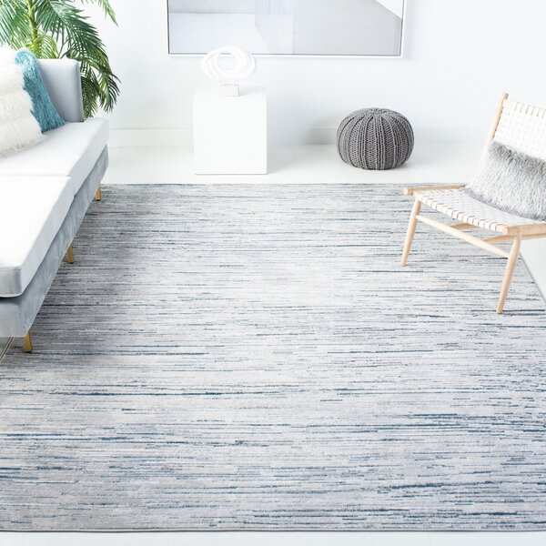 https://assets.wfcdn.com/im/91534008/resize-h600-w600%5Ecompr-r85/1344/134410022/Koopman+Performance+Gray%2FBlue+Rug.jpg