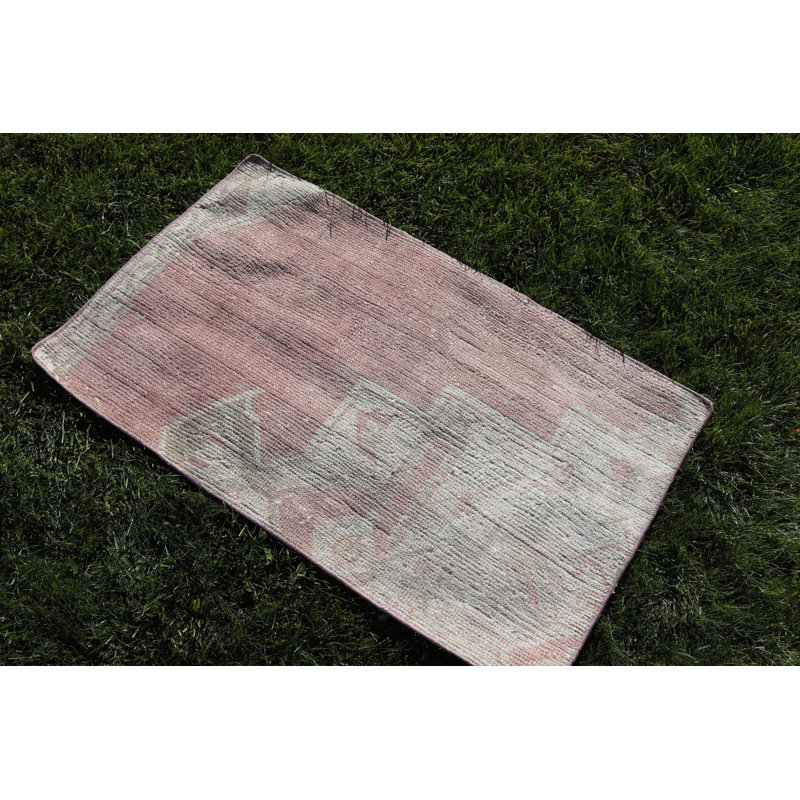 Vintage Small Turkish Antique Wool Rug Featuring Tassels for Door Mat or Boho Decor in Pink