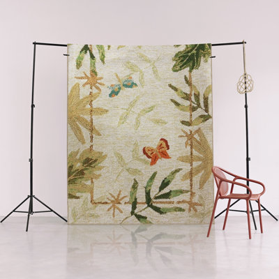 Tapis décoratif beige à motif de feuilles et de papillons
