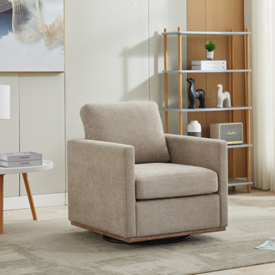 Fauteuil large pivotant rembourré