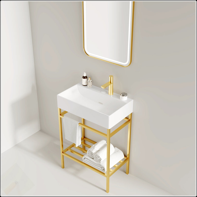 Meuble-lavabo autoportant de 24 po avec lavabo en céramique, pieds en métal ouverts, tablettes de rangement et décorations dorées pour une élégance moderne