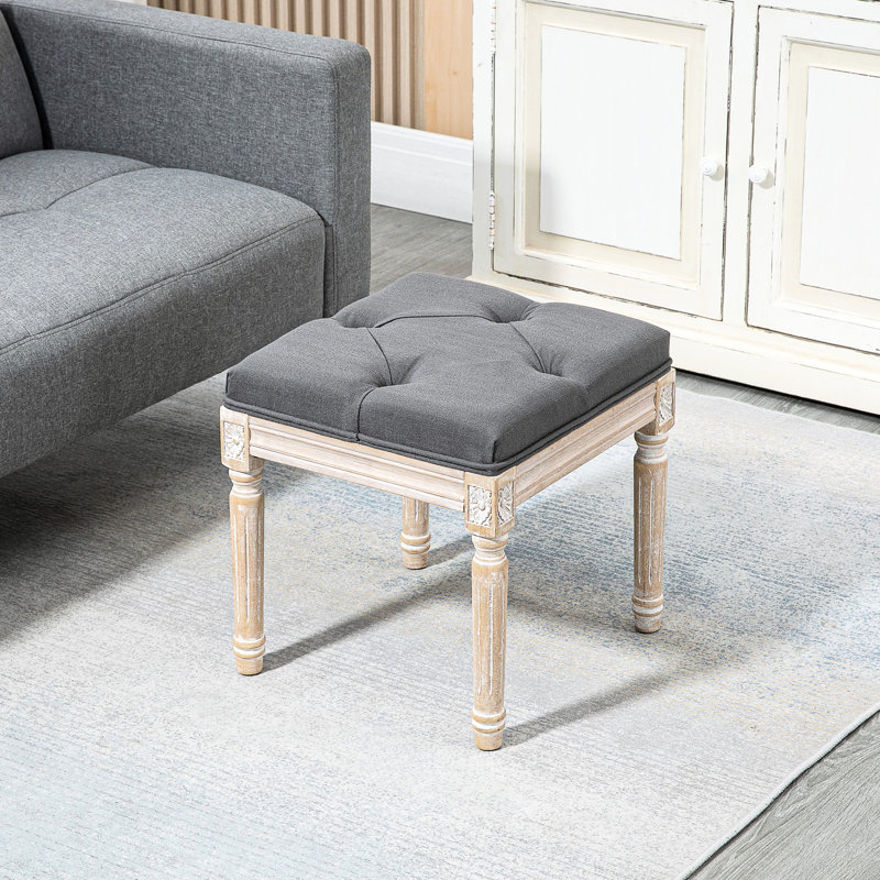 Repose-pieds avec siège rembourré et pieds en bois rustique gris pour le bureau du salon