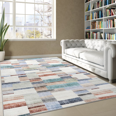 Jurdi Area Rug with Non-Slip Backing
