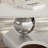 Aneia 51.2'' L Oval Coffee Table with Musical Note Base-455723757