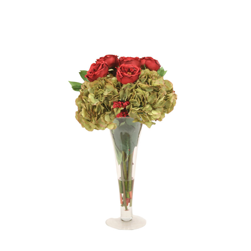 Arrangement floral mélangé dans un vase
